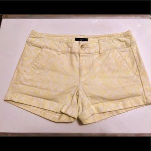 American eagle yellow and white printed shorts